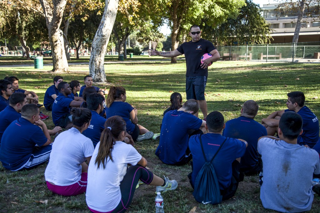 Sgt. Lopez leads a group of future and current recruits and educates them on different levels of income they may earn as they move up the ladder in the Marine Corps in Van Nuys, Calif. Photo: Lynn Levitt