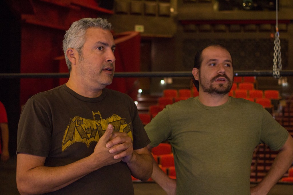 Edward Salas and Department Chair of Theatre and Dance Michael Gend discuss on solving a problem with a lighting fixture in the Performing Arts Building on Pierce College, Woodland Hills, Calif. Photo by: Alan Castro