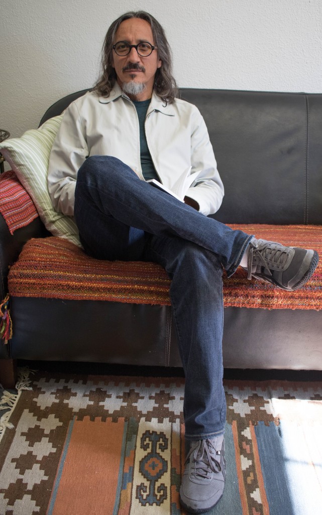 Fernando Oleas Spanish Professor and AFT Chapter President occupies his free time reading a book in his office Oct. 2, 2015 at Pierce College in Woodland Hills, Calif. Photo: Monica Salazar