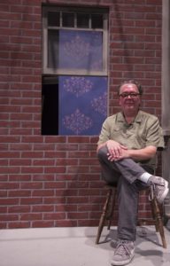 Michael Sande, theatre manager for the Performing Arts Department, sits on the set of the Winter 2016 production of <i>Fences</i> at Pierce College, in Woodland Hills Calif. on Nov. 22, 2016.