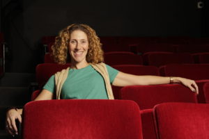 Raquel Lehman lounging in the Lounge Theatre. Photo by Alan Castro