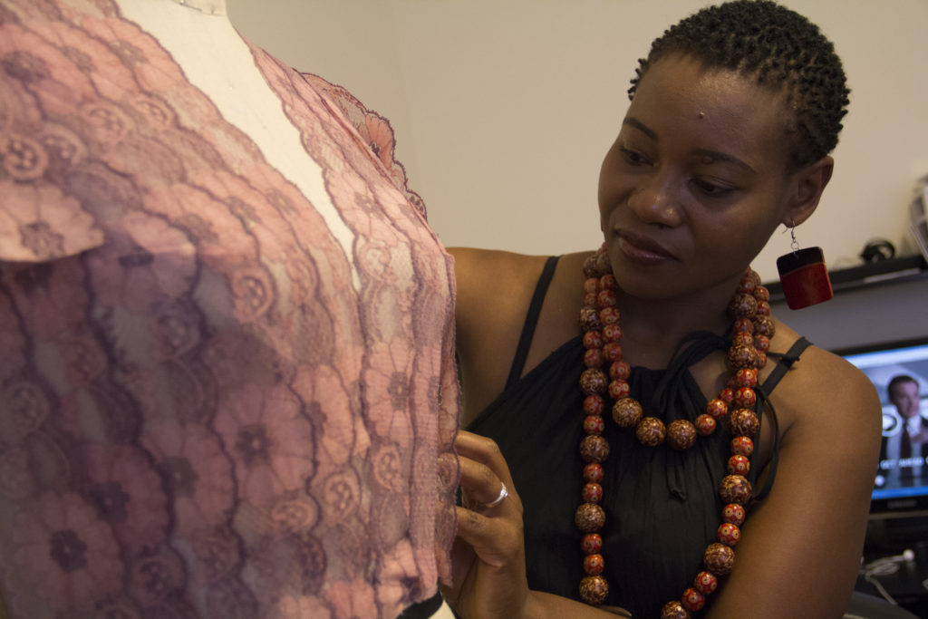 Chipo Mudzengi-Hwami pins together her latest design inside her Chatworth home. Photo by Alan Castro