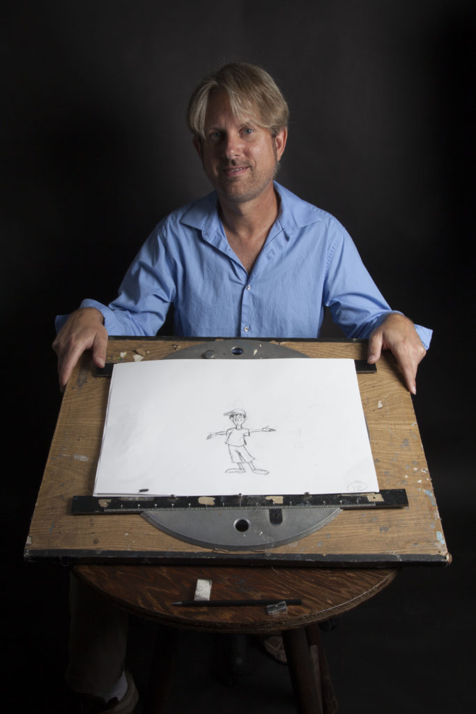 Scott Claus sits behind his drawing disc at Pierce College in Woodland Hills. Calif on Thursday, Oct 27, 2016. Photo by Alan Castro.